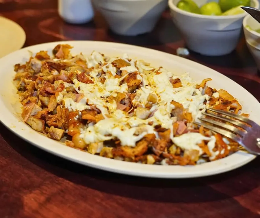 Gringa con queso derretido